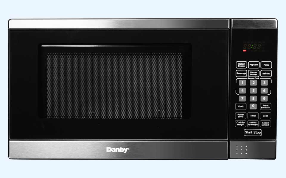 Danby appliances under cabinet microwave with stainless steel trim, right-side control panel, and glass door shown in a clean front view on a plain background