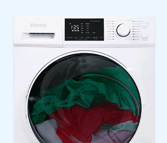 Danby appliances washers and dryers front load washer with digital display, control dial, and laundry visible through the circular glass door in a clean front view on a plain background
