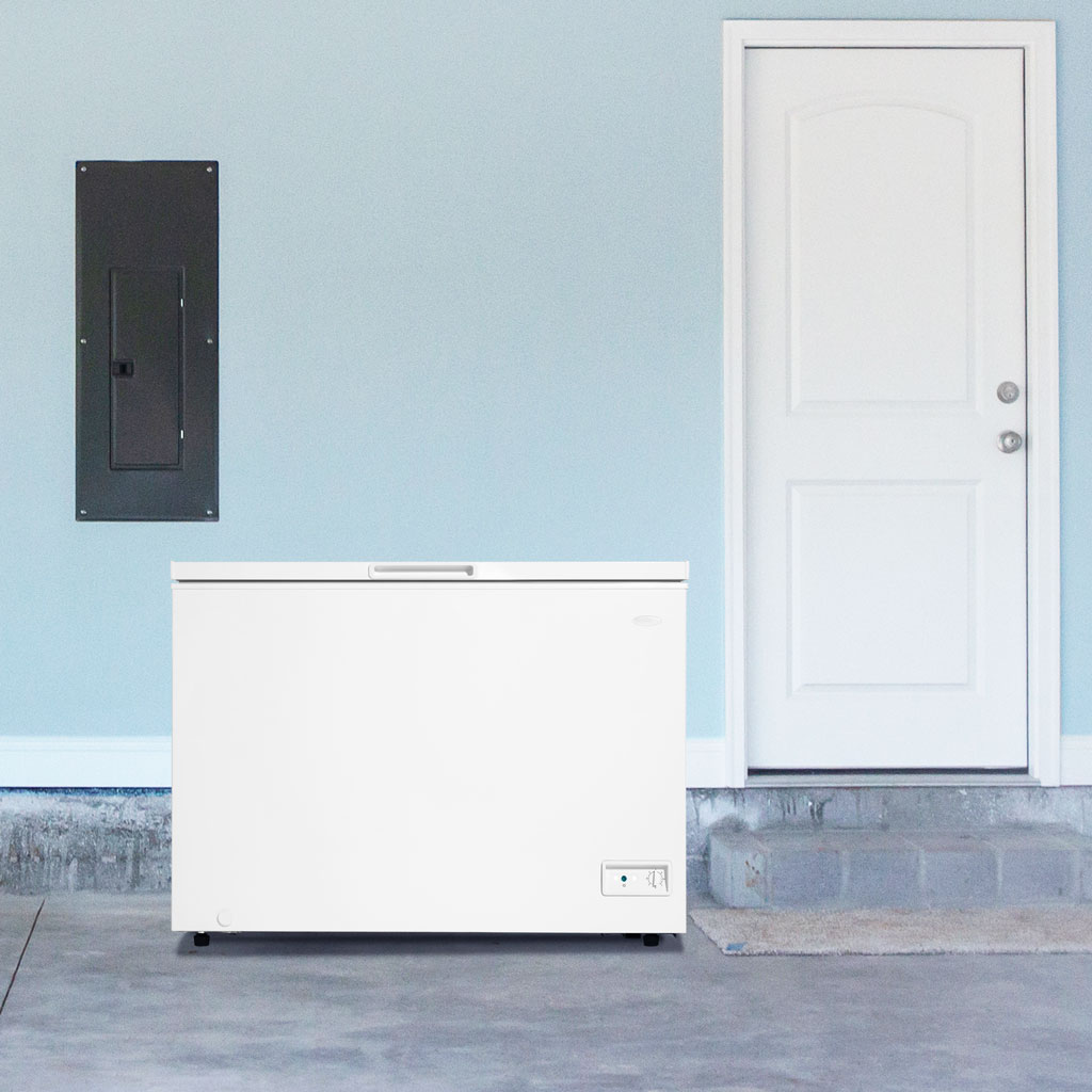 Danby 10.0 cu. ft. Square Model Chest Freezer in White 8 Danby DCF100A6WM 10.0 cu ft chest freezer in room setting beside wall with clean white finish
