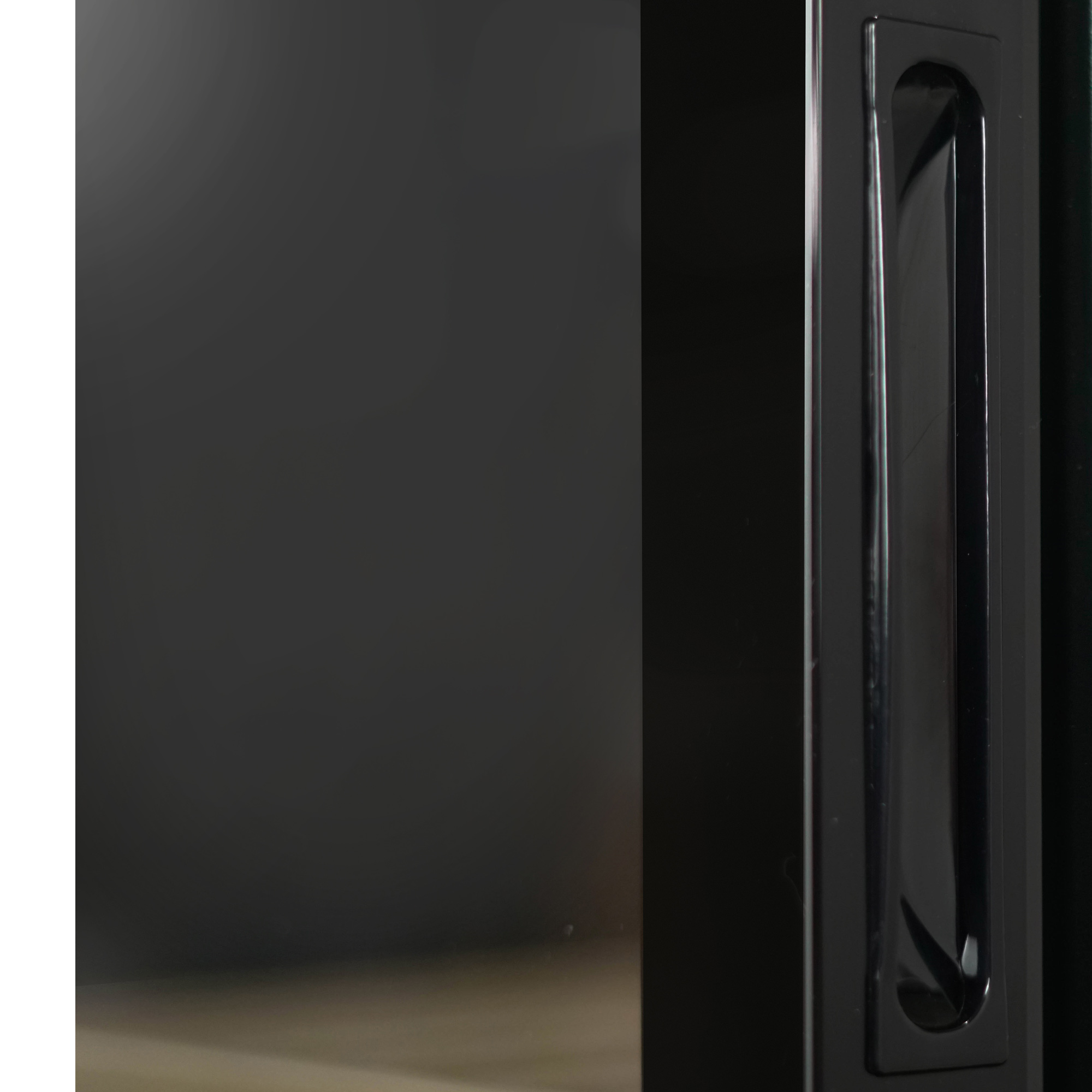 Danby 94 Bottle Free-Standing Wine Cooler in Black 9 Danby appliances 94 bottle wine cooler black DWC094L1B side view showing glass door edge and vertical handle detail