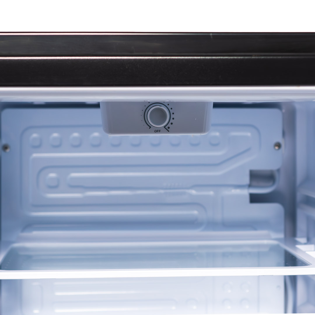 Danby appliances 2.6 cu ft compact fridge stainless DAR026A2BSLDB close-up of interior temperature control dial under the top panel