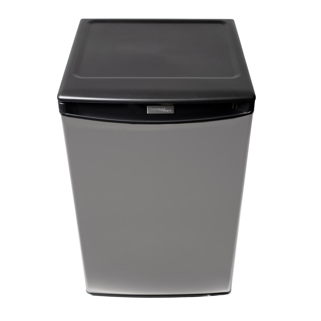 Danby appliances 4.4 cu ft compact fridge stainless DAR044A4BSSDD upper angled view showing top surface and cabinet design