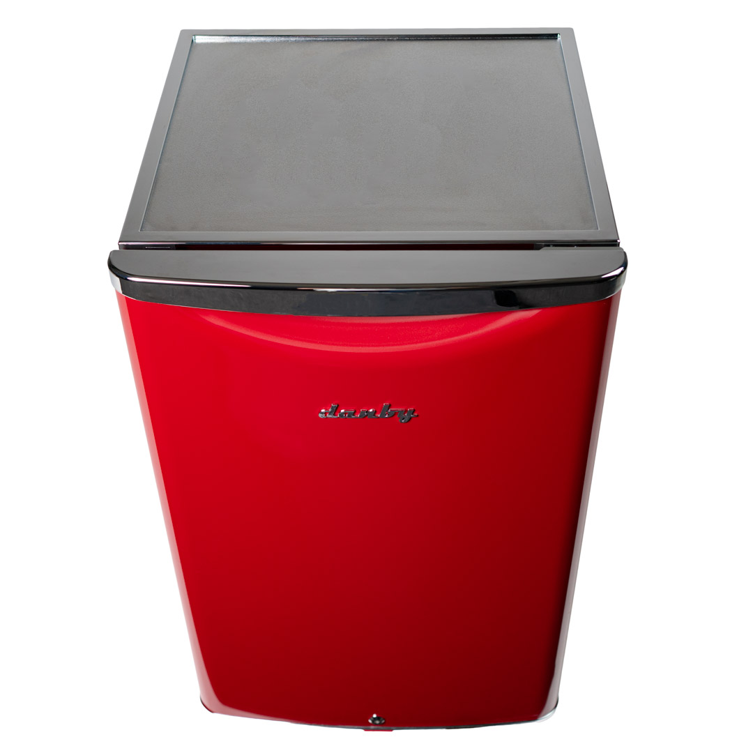 Danby appliances 4.4 cu ft compact fridge red DAR044A6LDB top angled view showing metallic red door, black top surface, and compact cabinet design