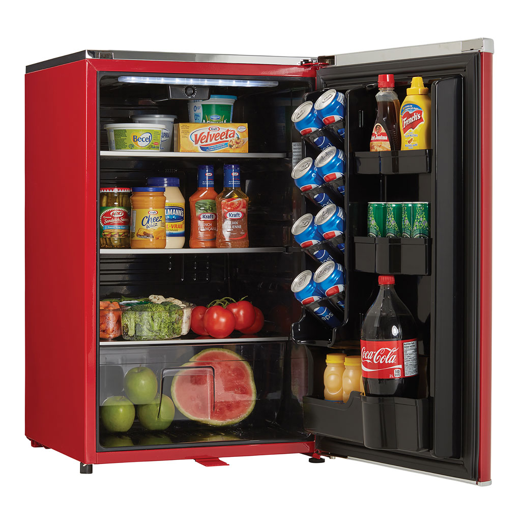 Danby appliances 4.4 cu ft compact fridge red DAR044A6LDB angled front view with door open showing interior stocked with beverages and food items on shelves