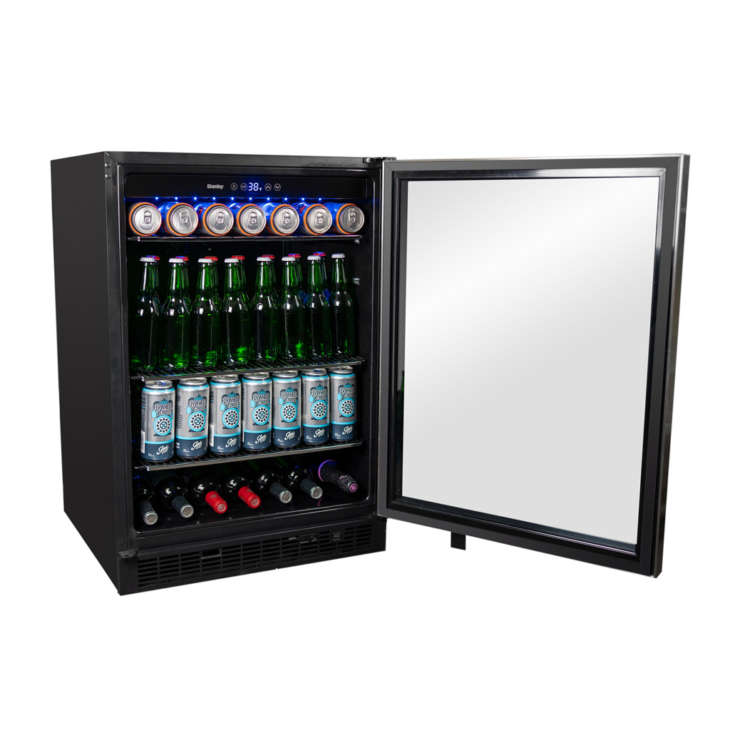 Danby appliances 5.7 cu ft built in beverage center stainless DBC057A1BSS front view showing interior shelves stocked with beverage cans and bottles with digital control panel visible
