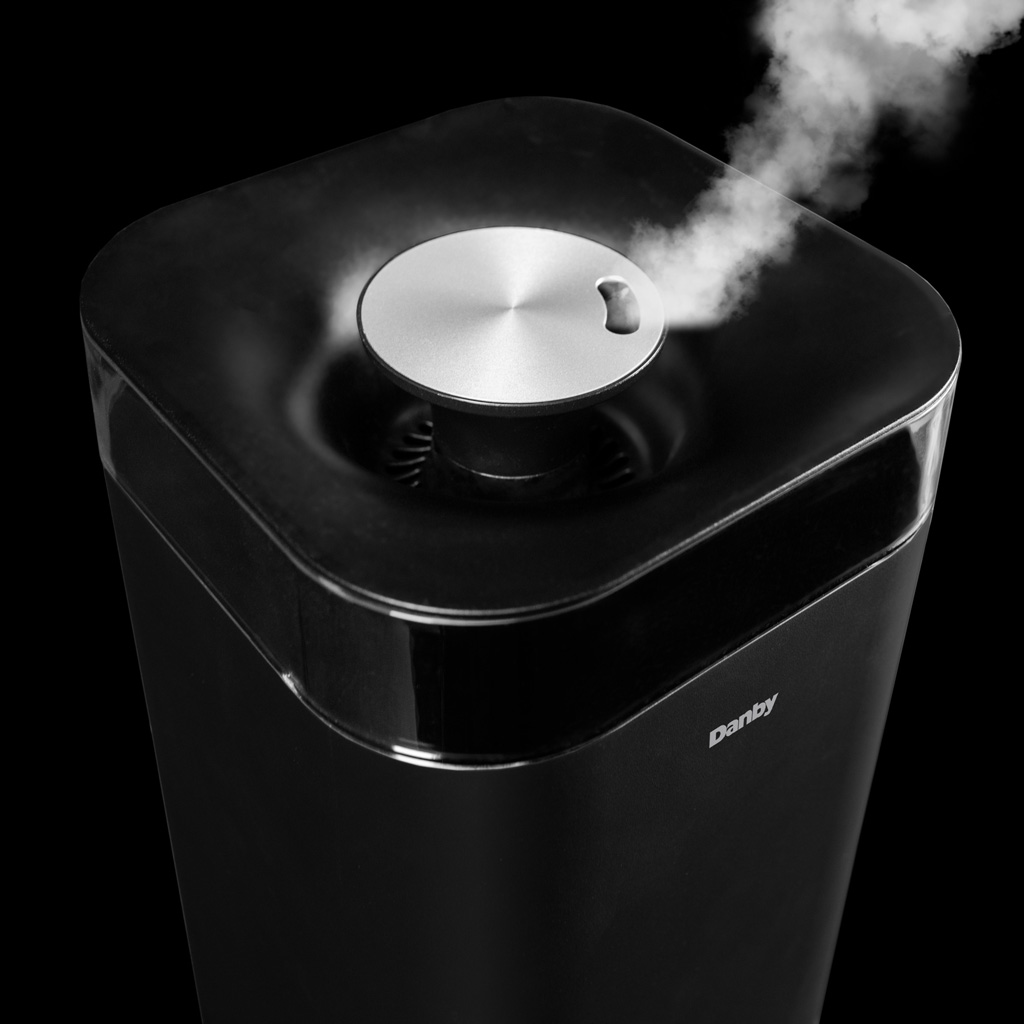Danby appliances 5L ultrasonic top fill humidifier black DBHR13211BDD1 close-up of top control dial and mist outlet releasing vapor