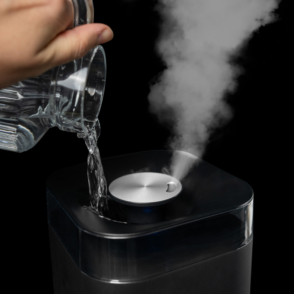 Danby appliances 5L ultrasonic top fill humidifier black DBHR13211BDD1 top fill design with water being poured into tank and mist visible