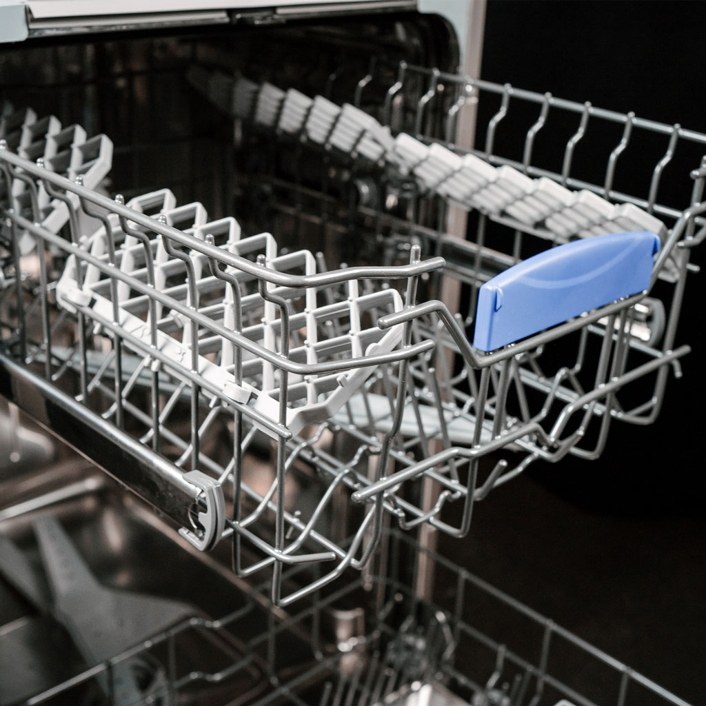 Danby appliances 18 inch built in dishwasher stainless steel DDW18D1ESS upper rack with blue handle and foldable tines shown in a close-up view