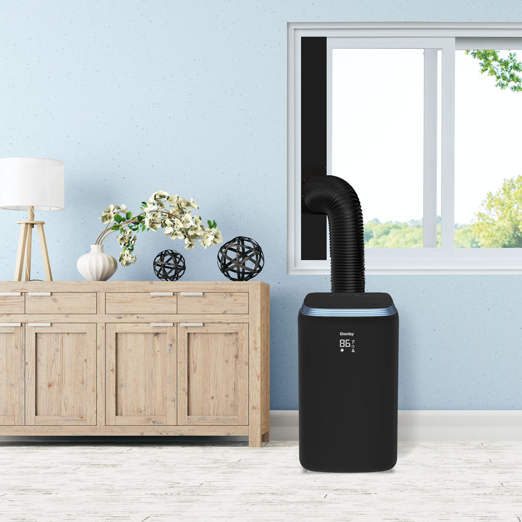 Danby DPA080E3BDB 12500 BTU portable air conditioner in home setting providing cooling comfort