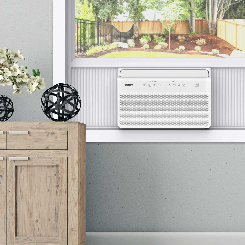 Danby DAC100B8IWDB-6 10000 BTU inverter window air conditioner installed in kitchen window providing room cooling