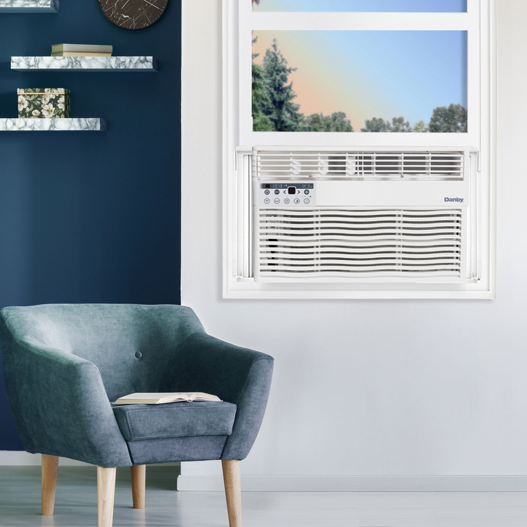 12,000 BTU Window Air Conditioner - Cools Up To 550 sq. ft. - Refurbished 5 Danby DAC120EB8WDB 12000 BTU window air conditioner installed in home office window providing cooling comfort