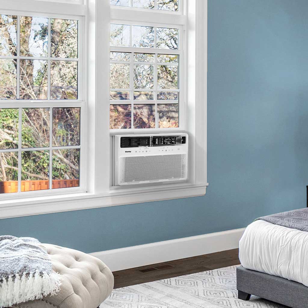 Danby DAC120ECBIWDB 12000 BTU window air conditioner installed in bedroom window providing cooling comfort