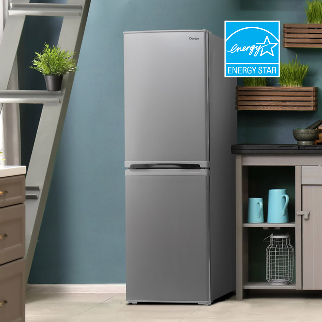Danby DCR049B1BSLDB 4.9 cu ft refrigerator in kitchen setting with Energy Star certification badge