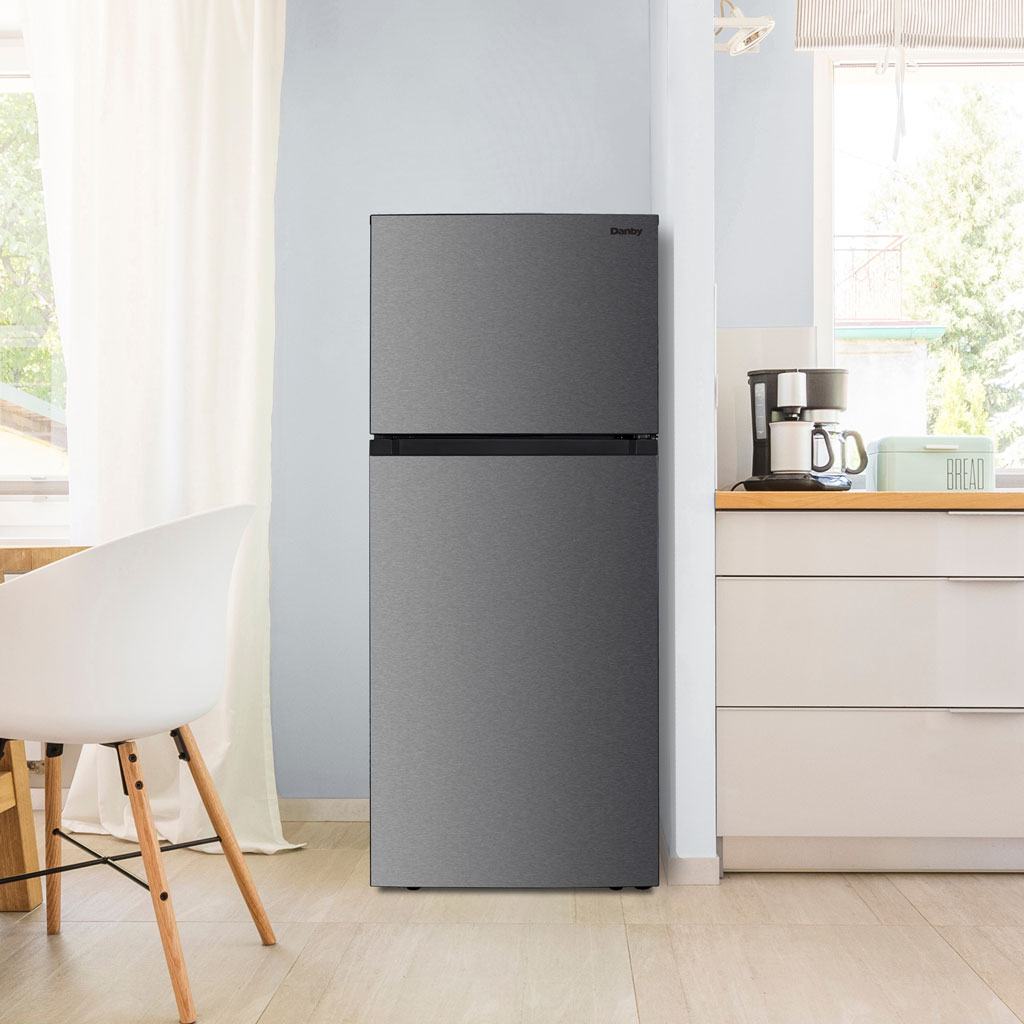 Danby 18 cu. ft. Top Mount Refrigerator in Stainless Steel Look 5 Danby DFF176B1SLDB 18.0 cu ft fridge in home kitchen setting