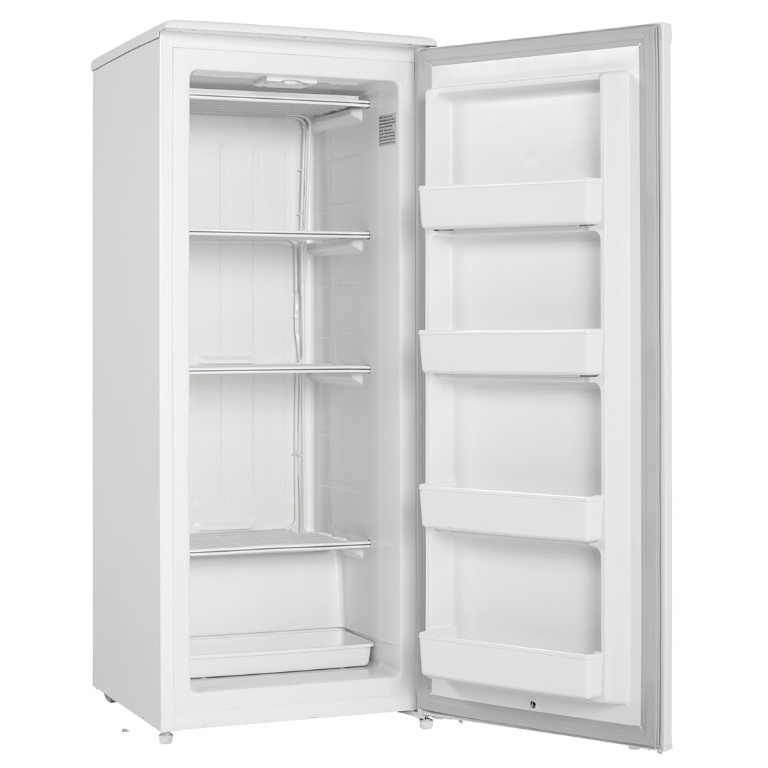 Danby Designer 10.1 cu. ft. Upright Freezer in White 9 Danby DUFM101A2WDD 10.1 cu ft upright freezer with door open showing empty interior storage compartments