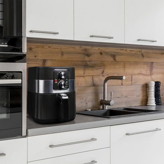 Air fryer recipes featured with a Danby air fryer on a modern kitchen countertop ready for everyday cooking