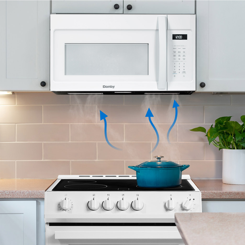 Danby DOM1742B1WDB 1.7 cu ft over range microwave vent feature installed above cooking surface