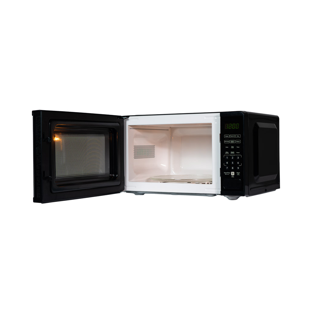 Danby DMW091A1B 0.9 cu ft countertop microwave left angle view with door open showing interior cavity